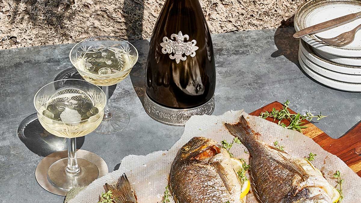 The perfect outdoor summer lunch with a bottle of Segura Viudas Heredad and grilled seabass.